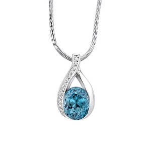 White gold diamond and blue topaz pendant