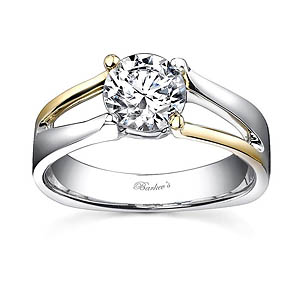 White and yellow gold solitaire ring
