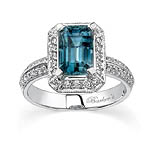 White gold diamond and blue topaz ring