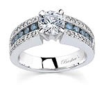 White gold engagement ring with white and blue diamonds