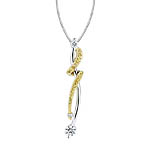 Two tone white and yellow gold pendant with white and yellow diamonds