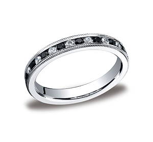 This elegant Platinum 3mm channel set eternity band features 18 round ideal-cut white and black diamonds along the center with milgrain. Total approximate carat weight is .36ct DIA and .36ct BLK DIA.