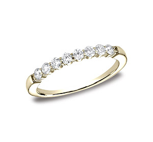 This elegant 2.5mm comfort-fit shared prong diamond band features round ideal cut diamonds. Total approximate carat weight is .32ct.