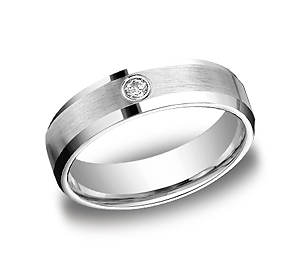 This stylish Palladium 6mm comfort-fit bezel set diamond band features a satin-finished center and a single round ideal-cut diamond in the center and a high polished beveled edge. Total diamond carat weight is approximately .08ct.