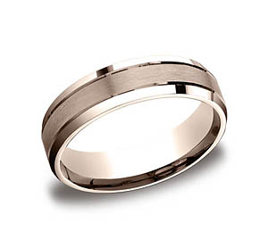 This unique 6mm comfort-fit satin-finished carved design band features center cuts along a high polished beveled edge.