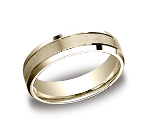 This unique 6mm comfort-fit satin-finished carved design band features center cuts along a high polished beveled edge.