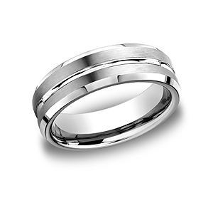 This Platinum 6mm comfort-fit satin-finished carved design band features a high polished center cut and beveled edges for remarkable style.