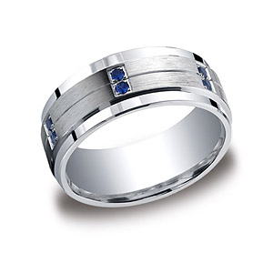 This elegant Argentium Silver 9mm comfort-fit pave set band features twelve round sapphire stones along a satin-finished center with a thin center cut and high polished edges. Approximate total diamond carat weight is .24ct.