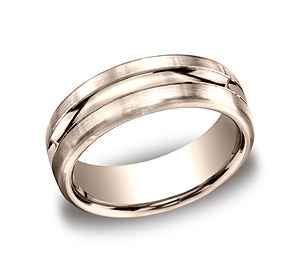 This 7.5mm comfort-fit carved design band features a satin-finished and high polished center cut for a rugged and stylish look.