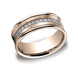 This stylish 7.5mm comfort-fit concave pave set channel diamond band features a satin-finished center with 16 beautiful round ideal-cut diamonds and high polished edges. Total diamond carat weight is approximately .32ct.