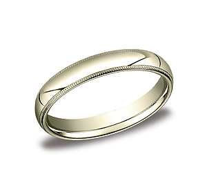This classic 4mm comfort-fit band features a traditional domed profile with milgrain.