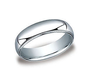 This classic 6mm comfort-fit band features a traditional domed profile with milgrain.