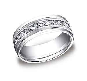 This beautiful Palladium 8mm comfort-fit channel set eternity diamond band features a strong high polished round edge that surrounds 12 beautiful round ideal-cut diamonds. Total diamond carat weight is approximately .96ct.