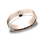 This stylish 6mm comfort-fit bezel set diamond band features a satin-finished center and a single round ide...