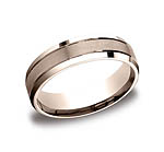 This unique 6mm comfort-fit satin-finished carved design band features center cuts along a high polished be...