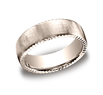 This unique 7.5mm comfort-fit satin-finished carved design band features an elegant rivet coin edging for ...