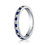 This gorgeous 3mm Platinum channel set eternity diamond band features 18 round ideal-cut diamonds and blue sapphires along the center and polished edges for an elegant look. Total diamond carat weight is approximately .36ct DIA and .50ct SA.