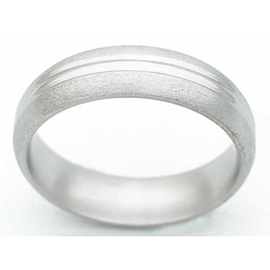 6MM DOMED TITANIUM BAND WITH ANOTHER DOME IN CENTER. CENTER DOME IS POLISHED, EDGES ARE A STONE FINISH.