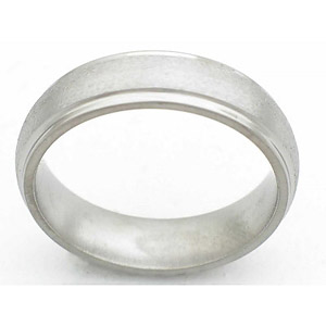 6MM DOMED TITANIUM BAND WITH GROOVED EDGES IN A STONE FINISH.