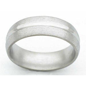 7MM DOMED TITANIUM BAND WITH A CONCAVED CENTER THAT IS POLISHED, THE EDGES ARE STONE.