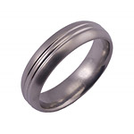 6MM DOMED TITANIUM BAND WITH ANOTHER DOME IN CENTER. CENTER DOME IS POLIS...