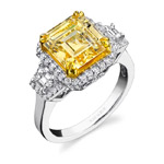 18k White and Yellow Gold Cushion Cut Fancy Yellow Diamond Ring with Trapezoid Side Stones